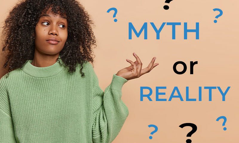 Lady pointing to hair myth or reality with question marks
